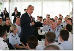 President George W. Bush addresses members of the Australian Defense Force during a luncheon Wednesday on Garden Island in Sydney. The President told the troops, "I believe we are writing one of the great chapters in the history of liberty and peace.So I want to thank you." White House photo by Eric Draper