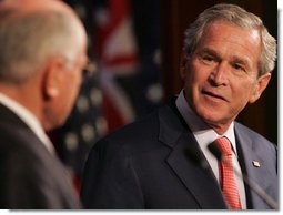 President George W. Bush acknowledges his host, Australia's Prime Minister John Howard, during their joint press availability Wednesday, Sept. 5, 2007, in Sydney. White House photo by Chris Greenberg