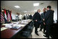 President George W. Bush greets Iraqi Prime Minister Nouri al Maliki, right, before the start of his meeting with the Iraqi National Leadership at Al Asad Airbase, Al Anbar Province, Iraq, Monday, September 3, 2007. White House photo by Eric Draper