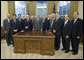 President George W. Bush poses for a photo with Orthodox Union leadership Thursday, Sept. 25, 2008, in the Oval Office of the White House. President Bush met with the Orthodox Union leadership to acknowledge the 110th anniversary of the Orthodox Union's founding, and to wish the Jewish people a Happy New Year. White House photo by Joyce N. Boghosian