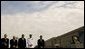 President George W. Bush is joined from left by former Secretary of Defense Donald Rumsfeld, U.S. Secretary of Defense Robert Gates, Chairman of the Joint Chiefs of Staff, Admiral Michael Mullen and James J. Laychak, chairman of the Pentagon Memorial Fund, Inc. as they bow their heads during a Moment of Silence Thursday, Sept. 11, 2008, at the dedication of the 9/11 Pentagon Memorial at the Pentagon in Arlington, Va. White House photo by Eric Draper