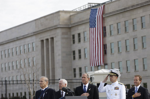 President George W. Bush is joined from left by former Secretary of Defense Donald Rumsfeld, U.S. Secretary of Defense Robert Gates, Chairman of the Joint Chiefs of Staff, Admiral Michael Mullen and James J. Laychak, chairman of the Pentagon Memorial Fund, Inc.,Thursday, Sept. 11, 2008, during National Anthem at the dedication of the 9/11 Pentagon Memorial at the Pentagon in Arlington, Va. White House photo by Eric Draper