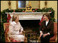 Mrs. Laura Bush enjoys a visit Tuesday morning, Dec. 11, 2007, with Mrs. Clio Napolitano, wife of President Giorgio Napolitano of Italy, during their visit to the White House. White House photo by Shealah Craighead