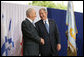 President George W. Bush and President Shimon Peres of Israel shake hands after their meeting Wednesday, May 14, 2008, in Jerusalem. White House photo by Chris Greenberg