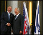 President George W. Bush and President Shimon Peres of Israel pause for photographers as they meet Wednesday, May 14, 2008, at President Peres’ Jerusalem residence. White House photo by Joyce N. Boghosian