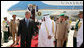 President George W. Bush and King Abdullah bin Abdulaziz walk the red carpet after the arrival Friday, May 16, 2008, of the President and Mrs. Laura Bush to Riyadh. As guests of the King, the President and Mrs. Bush will overnight at his Al Janadriyah Ranch before continuing on their Mideast Visit Saturday to Egypt. White House photo by Joyce N. Boghosian