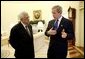 President George W. Bush and Palestinian Prime Minister Mahmoud Abbas meet in the Oval Office Friday, July 25, 2003. Meeting for the first time at the White House, the two leaders also held a working lunch and a joint press conference in the Rose Garden. White House photo by Eric Draper.