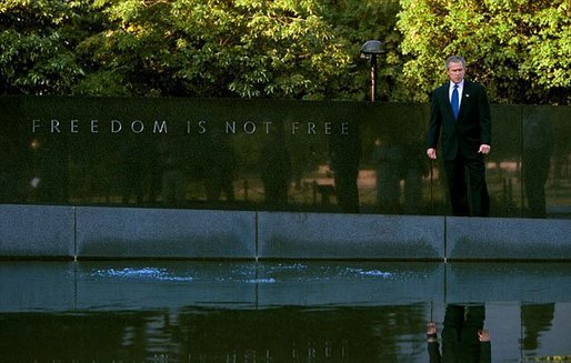President George W. Bush tours the Korean War Veterans Memorial in Washington, D.C., Friday, July 25, 2003. "This memorial is -- and those who served in Korea also remind us of the challenges we face today, and it gives us a chance to reflect on the sacrifices that are being made on behalf of freedom today. And our nation will be eternally grateful for the men and women who serve today, as we are for those who have served in the past," said the President to the press at the memorial. Sunday, July 27, marks the 50th anniversary of the signing of the armistice that ended the Korean War. White House photo by Paul Morse.