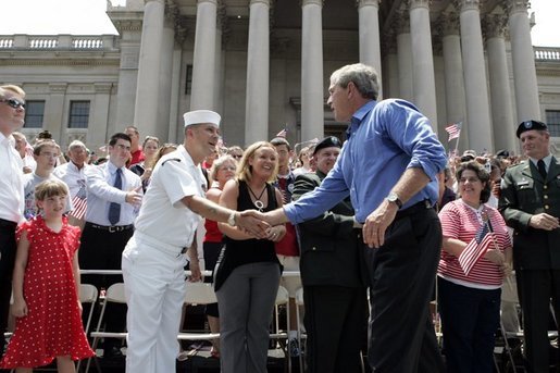 President George W. Bush greets the crowd at the Fourth of July Celebration on the steps of the Capitol in Charleston, West Virginia on Independence day, 2004. White House photo by Tina Hager