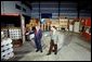 President George W. Bush and Jon Kreykes of the National Security Advanced Technologies group, look over equipment obtained from Libya’s former nuclear weapons program at the Oak Ridge National Laboratory in Oak Ridge Tenn., Monday, July 12, 2004. White House photo by Tina Hager