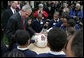 Youngsters with Camp Fire USA and other guests join President George W. Bush around May, the 2007 National Thanksgiving turkey, during Rose Garden festivities surrounding its official pardoning Tuesday, Nov. 20, 2007. White House photo by Joyce N. Boghosian