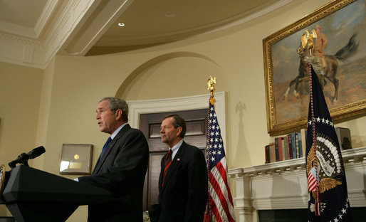 With Secretary Mike Leavitt of the Department of Health and Human Services looking on, President George W. Bush delivers a statement on Import Safety Tuesday, Nov. 6, 2007, in the Roosevelt Room of the White House. Said the President, ".we need to do more to ensure that American families have confidence in what they find on our store shelves. They have the right to expect the food they eat, or the medicines they take, or the toys they buy for their children to be safe." White House photo by Chris Greenberg