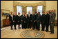 Presidents George W. Bush stands with the recipients of the 2006 Presidential Awards for Excellence in Science, Mathematics, and Engineering Mentoring Friday, Nov. 16, 2007, in the Oval Office. White House photo by Joyce N. Boghosian