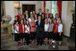 President George W. Bush stands with members of the University of Maryland Women's Field Hockey 2006 Championship Team Monday, June 18, 2007 at the White House, during a photo opportunity with the 2006 and 2007 NCAA Sports Champions. White House photo by Eric Draper