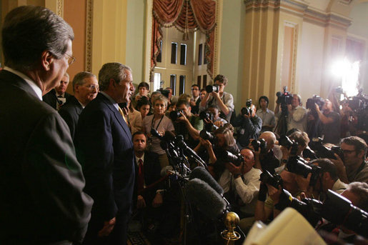 President George W. Bush, joined by Senate Minority leader Sen. Mitch McConnell and Sen. Trent Lott, foreground-left, addresses members of the media at the U.S. Capitol Tuesday, June 12, 2007, following his meeting with Senate Republican leaders and lunch with the Senate's Republican membership to ask their support for immigration reform legislation. White House photo by Joyce N. Boghosian