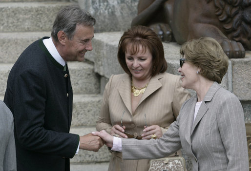 With Mrs. Lyudmila Putina looking on, Mrs. Laura Bush is greeted at Schlitz Castle by Mathias Stinnes, owner of Burg Schlitz and acting partner of the Hugo Stinnes Company, Thursday, June 7, 2007, in Hohen Demzin, Germany. The castle hotel was the sight of the official G8 spouse program. White House photo by Shealah Craighead