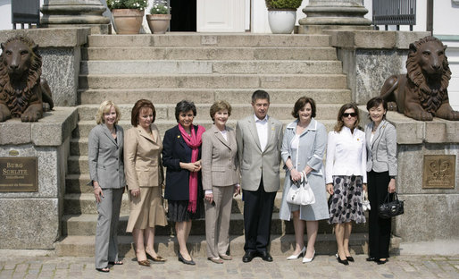 Partners of the G8 leaders pose outside Burg Schlitz Thursday, June 7, 2007, in Hohen Demzin, Germany. From left are: Mrs. Laureen Harper, Mrs. Lyudmila Putina, Mrs. Flavia Franzoni, Mrs. Laura Bush, Dr. Joachim Sauer, Mrs. Cherie Booth Blair, Mrs. Maria Margarida Pinto Ribeiro Sousan Uva Barroso and Mrs. Akie Abe. White House photo by Shealah Craighead