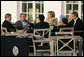 President George W. Bush sits with fellow G8 leaders Thursday afternoon, June 7, 2007, during a reception prior to dinner on the terrace of the Kempinski Grand Hotel in Heiligendamm, Germany. Clockwise from the President are: Chancellor Angela Merkel of Germany; Prime Minister Tony Blair of the United Kingdom; Prime Minister Romano Prodi of Italy; Jose Manuel Barroso, President of the European Commission, and Prime Minister Stephen Harper of Canada. White House photo by Eric Draper