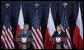 President George W. Bush draws a smile from Poland's President Lech Kaczynski during their joint statement Friday, June 8, 2007, in Gdansk. Said President Bush, "One thing I do want to do is praise this good country for being so strong for freedom. I love to be in a land where people value liberty, and are willing to help others realize the blessings of liberty." White House photo by Chris Greenberg