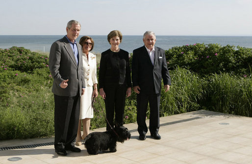 President George W. Bush and Mrs. Laura Bush join Polish President Lech Kaczynski and Maria Kaczynski, with their dog Titus, for a stroll Friday, June 8, 2007, at the Polish presidential seaside retreat in Jurata, Poland. White House photo by Eric Draper