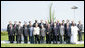 Leaders of the G8 stand for a photo with Outreach Representatives Friday, June 8, 2007, at the conclusion of the G8 Summit in Heiligendamm, Germany. White House photo by Eric Draper