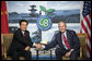 President George W. Bush shakes hands with President of China, Hu Jintao, during their meeting at the G-8 Summit Wednesday, July 9, 2008, in Toyako, Japan. White House photo by Eric Draper