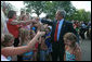 President George W. Bush unexpectedly drops by Mabry Meadors 7th birthday party Tuesday, July 1, 2008 in Little Rock Arkansas. White House photo by Joyce N. Boghosian