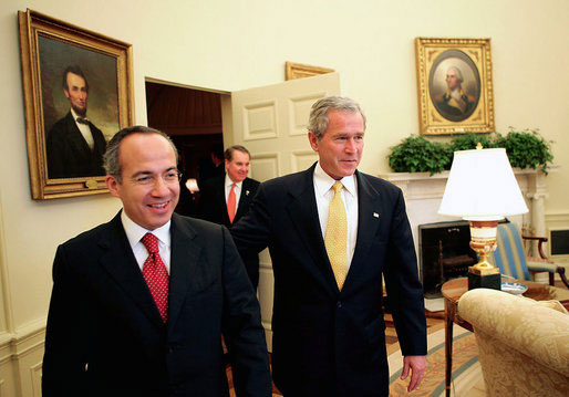 President George W. Bush welcomes President-elect Felipe Calderon of Mexico to the Oval Office Thursday, Nov. 9, 2006. White House photo by Eric Draper