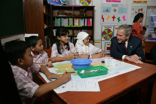 President George W. Bush talks with students at Papandaya Public Elementary School in Bogor Palace, Indonesia, Monday, Nov. 20, 2006. White House photo by Shealah Craighead