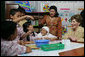 Mrs. Laura Bush talks with students at Papandaya Public Elementary School in Bogor Palace, Indonesia, Monday, Nov. 20, 2006. White House photo by Shealah Craighead