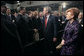 President George W. Bush greets the audience after delivering remarks Tuesday, Nov. 28, 2006, with Latvia President Vaira Vike-Freiberga at Latvia University in Riga. White House photo by Eric Draper