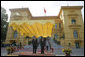 President George W. Bush and President Nguyen Minh Triet participate in an arrival ceremony at the Presidential Palace in Hanoi Friday, Nov. 17, 2006. The President thanks President Nguyen for hosting APEC and said he looked "forward to continuing to work to make sure our bilateral relations are close." White House photo by Eric Draper