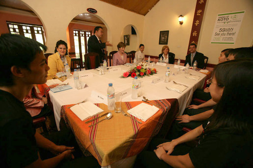 Mrs. Laura Bush is welcomed to a roundtable and lunch at the KOTO Restaurant in Hanoi by Jimmy Pham, Founder and Project Director of Know One, Teach One, a grass-roots humanitarian program designed to train Hanoi youth in the service industry. White House photo by Shealah Craighead