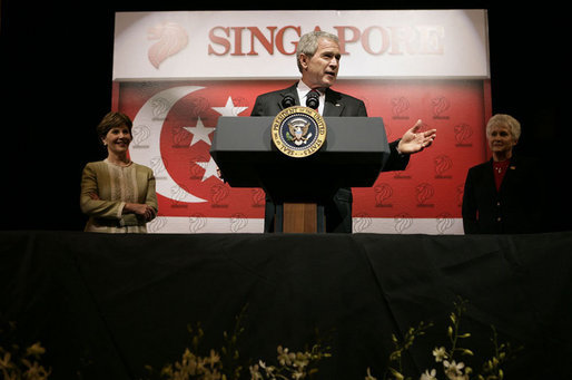 President George W. Bush addresses U.S. embassy staff and families during an embassy greeting in Singapore Thursday, November 16, 2006. U.S. Ambassador Patricia Herbold is pictured at the right. White House photo by Eric Draper