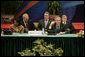 Seated with Secretary of State Condoleezza Rice, President George W. Bush participates in a meeting with Southeast Asian leaders Saturday, Nov. 18, 2006, at the International Convention Center in Hanoi. White House photo by Eric Draper