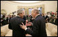 President George W. Bush and Israeli Prime Minister Ehud Olmert stand together talking following their meeting with members of the media Monday, Nov. 13, 2006, in the Oval Office at the White House. White House photo by Eric Draper