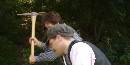 Photo of park rangers interpreting building the canal.