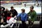 Laura Bush and former Olympian Dr. Eric Heiden meets with the family and parents of US speed skater Chad Hedrick after Hedrick finished first place in his heat taking the first US gold medal in the 2006 Winter Olympics in Turin, Italy. White House photo by Shealah Craighead