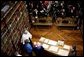 Laura Bush looks at an Ancient Thesis of Montichelli during a tour given by Enrico Artifoni, right, Paolo Novaria, right, and Andrea Carosso at the University of Turin Saturday, Feb. 11, 2006, in Turin, Italy. White House photo by Shealah Craighead