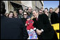 President George W. Bush visits with base personnel and their families before departing Buckley Air Force Base in Aurora, Colo. Tuesday, Feb. 21, 2006. White House photo by Eric Draper