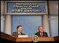 President George W. Bush joins Dr. Mark McClellan, administrator of the Centers for Medicare and Medicaid Services, at a panel discussion Thursday, Feb. 16, 2006 on health care initiatives at the U.S. Department of Health and Human Services in Washington. White House photo by Kimberlee Hewitt