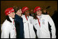 Laura Bush poses for photos with 2006 U.S. Winter Olympic athletes in Turin, Italy, Friday, Feb. 10, 2006 before the Opening Ceremony. White House photo by Shealah Craighead