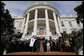 President George W. Bush holds up a University of Texas Longhorns jersey with head football coach Mack Brown, Tuesday, Feb. 14, 2006 on the South Lawn of the White House, during ceremonies to honor the 2005 NCAA Football Champions. White House photo by Paul Morse