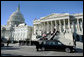 A military honor guard descends the steps of the Senate carrying the casket of former President Gerald R. Ford from the Capitol to an awaiting hearse, Tuesday, January 2, 2007, for the procession to the State Funeral at the National Cathedral in Washington, D.C. White House photo by David Bohrer