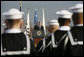 President George W. Bush addresses the troops during an Armed Forces Full Honor Review at the Pentagon Friday, Dec. 15, 2006, in honor of outgoing Secretary of Defense Donald Rumsfeld, who served since 2001, telling the audience that Secretary Rumsfeld is "one of America's most skilled, energetic and dedicated public servants." White House photo by Paul Morse