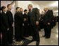 President George W. Bush and Vice President Dick Cheney shake hands with military personnel following their meeting with U.S. military leaders at the Pentagon, Wednesday, Dec. 13, 2006. White House photo by Eric Draper