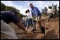 Working alongside volunteers, President George W. Bush lends a hand in repairing the Old Boney Trail at the Santa Monica Mountains National Recreation Area in Thousand Oaks, Calif. File photo. White House photo by Paul Morse.