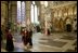 Walking with Dr. Wesley Carr, President George W. Bush tours Westminster Abbey Thursday, Nov. 20, 2003. Mrs. Bush is also pictured. White House photo by Eric Draper