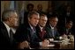 President George W. Bush meets with his Cabinet the day after beginning the disarmament of Iraq in the Cabinet Room Thursday, March 20, 2003. Pictured with the President are, from left, State Secretary Colin Powell, Defense Secretary Donald Rumsfeld, Commerce Secretary Don Evans and Transportation Secretary Norman Mineta. White House photo by Paul Morse.