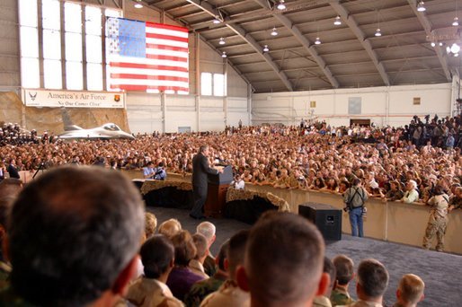 President George W. Bush addresses military personnel inside a hangar at MacDill Air Force Base in Tampa, Florida, Wednesday, March 26, 2003. White House photo by Paul Morse
